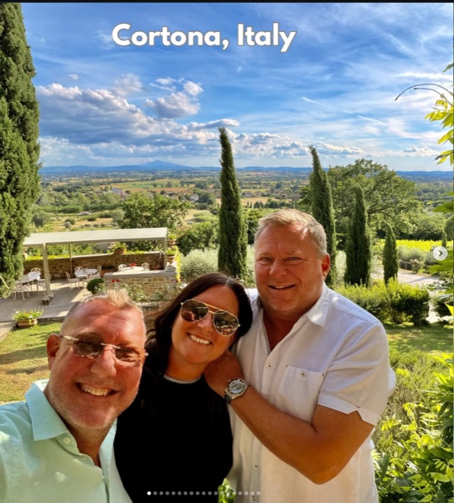 Aaron, Amanda, and a friend overlooking the Tuscan countryside near Cortona, Italy